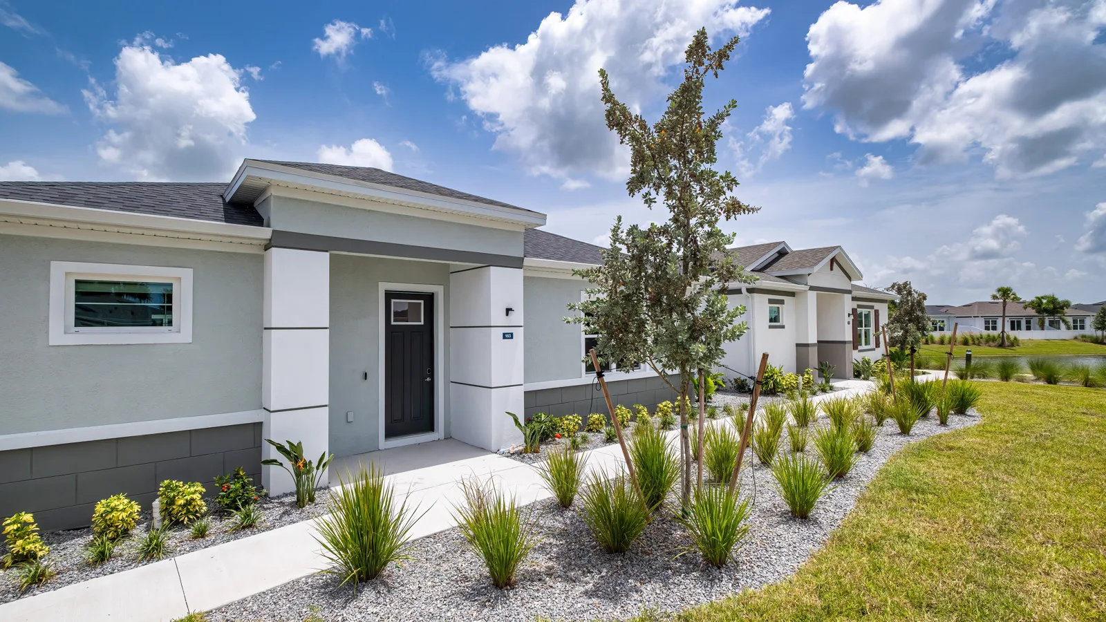 Yardly Artisan Lakes in Palmetto, FL. This beautiful community has pet-friendly 1- & 2-bedroom homes with backyards for rent, and also features a pool, onsite gym dog park, pickle ball court, and community clubhouse.