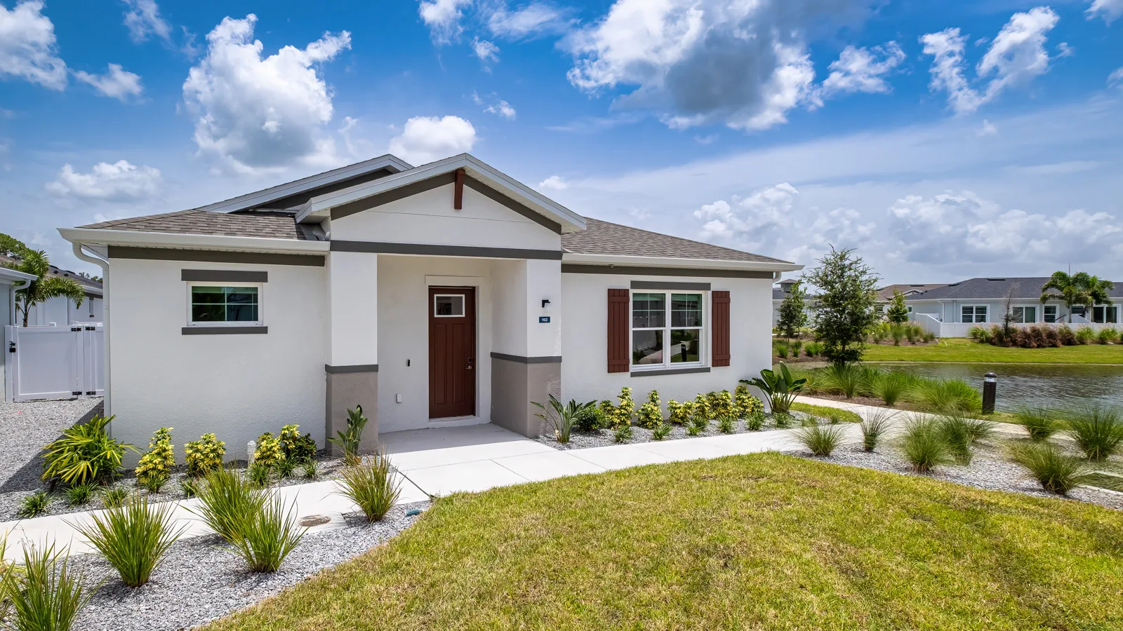 Yardly Artisan Lakes in Palmetto, FL. This beautiful community has pet-friendly 1- & 2-bedroom homes with backyards for rent, and also features a pool, onsite gym dog park, pickle ball court, and community clubhouse.