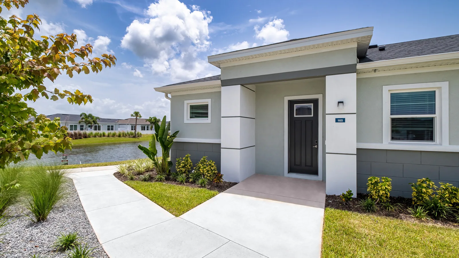 Yardly Artisan Lakes in Palmetto, FL. This beautiful community has pet-friendly 1- & 2-bedroom homes with backyards, and patio lanai's for rent, and also features a pool, onsite gym dog park, pickle ball court, and community clubhouse.