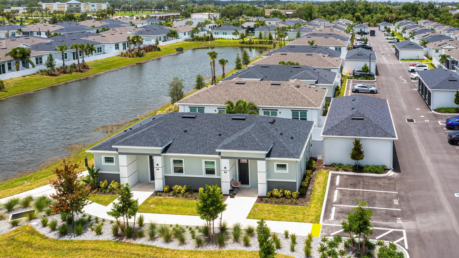 Yardly Artisan Lakes in Palmetto, FL. This beautiful community has pet-friendly 1- & 2-bedroom homes with backyards for rent, and also features a pool, onsite gym dog park, pickle ball court, and community clubhouse.